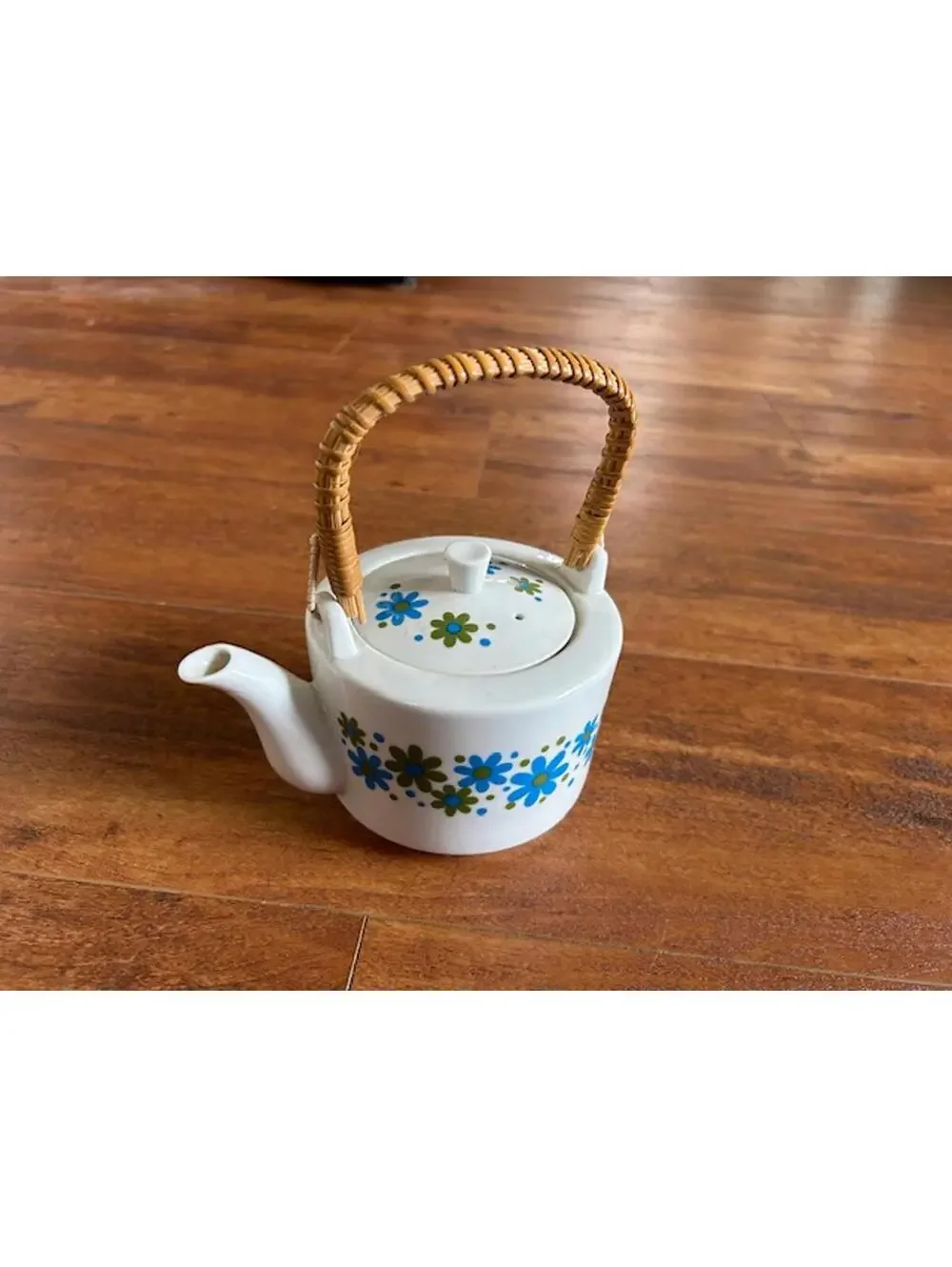Vintage Ceramic Teapot with Blue and Green Floral Design and Woven Handle